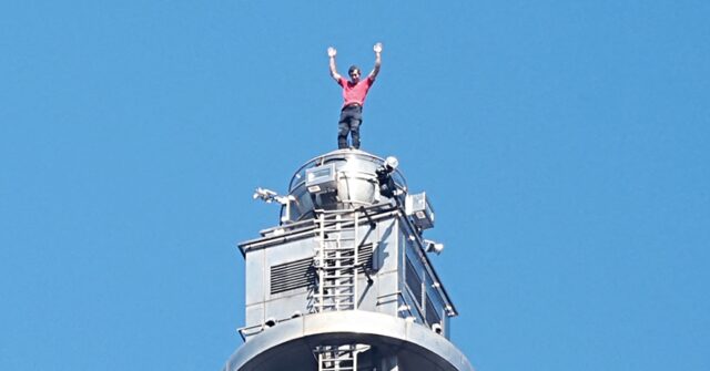 watch:-american-climber-summits-1,667-foot-skyscraper-with-no-ropes