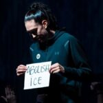 ‘disgusted’-stewart-protests-shooting-with-sign