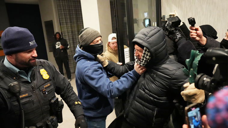 anti-ice-agitators-clash-with-federal-agents-at-minneapolis-hotel,-as-agents-deploy-tear-gas,-flashbangs