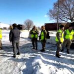 national-guard-in-minnesota-hands-out-coffee,-donuts-to-anti-ice-protesters