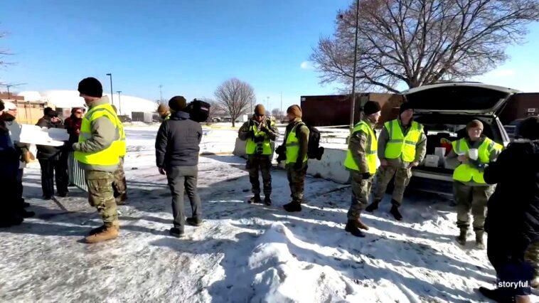 national-guard-in-minnesota-hands-out-coffee,-donuts-to-anti-ice-protesters