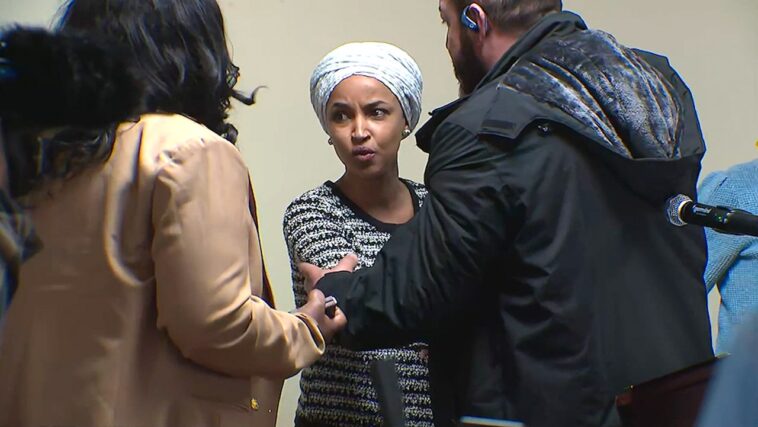 ilhan-omar-sprayed-by-unknown-substance-after-man-charges-her-at-minneapolis-town-hall