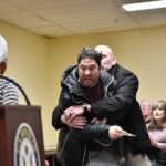 man-rushes-ilhan-omar-at-town-hall,-sprays-her-with-unknown-liquid