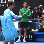 djokovic,-down-2-sets,-advances-when-musetti-hurt