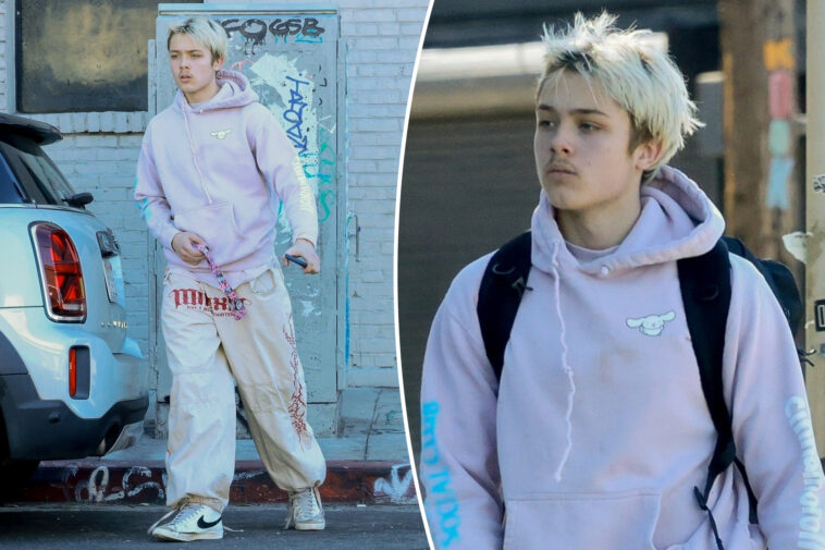 knox-jolie-pitt-rocks-bleached-hair,-pink-hoodie-after-leaving-muay-thai-class-in-la