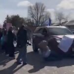 student-hit-by-car-at-anti-ice-protest-at-nebraska-high-school-(video)