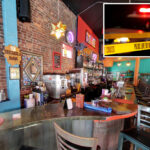 unhinged-woman-storms-nyc-restaurant,-whacks-diner-with-glass-bottle-before-socking-four-others-in-random-attack