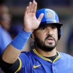 sources:-reds-land-slugger-suarez-with-$15m-deal