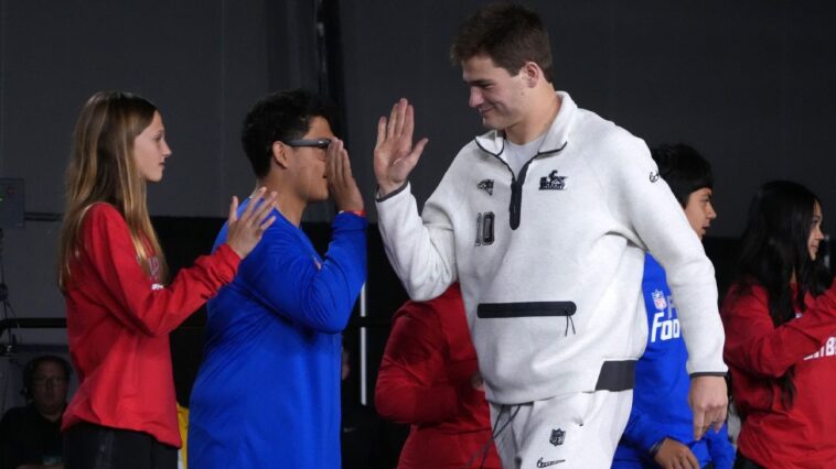 maye-(shoulder)-‘turned-a-corner,’-threw-normally