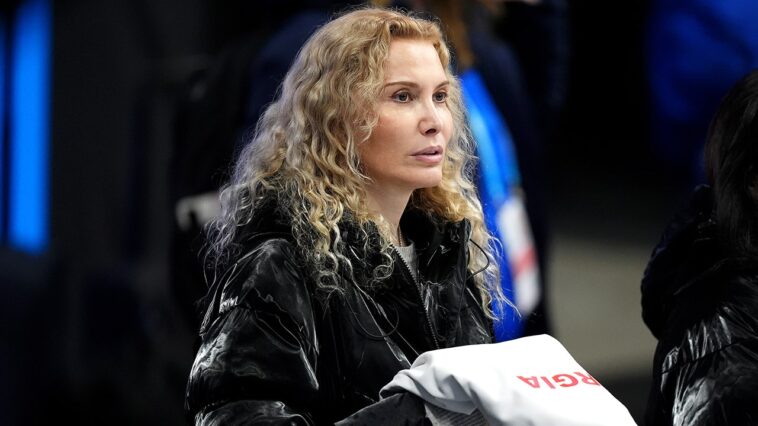 ex-russian-olympic-coach-returns-to-spotlight-at-2026-winter-games-despite-doping-shadow