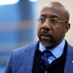 raphael-warnock-likens-journalists-to-pastors-as-he-decries-don-lemon’s-arrest