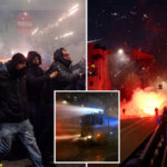 hundreds-of-hooded-protesters-throw-fireworks,-clash-with-police-after-winter-olympics-opening-ceremony-in-milan