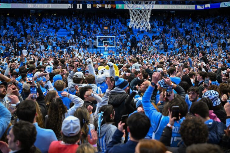 unc-fans-prematurely-storm-court-after-game-winner-just-before-buzzer-vs.-rival-duke-in-wild-scene