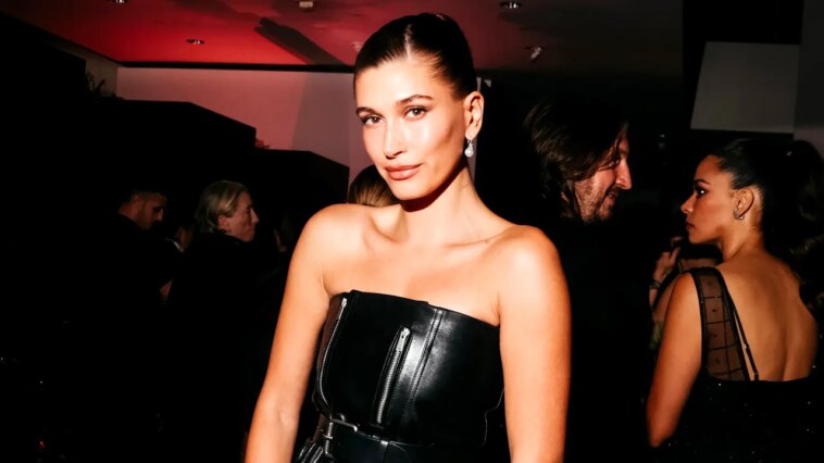 hailey-bieber-leaves-little-to-imagination-in-sheer-saint-laurent-gown