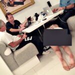 business-meeting,-epstein-style:-disturbing-photo-shows-epstein-and-associates-working-as-bikini-clad-woman-crawls-under-the-table