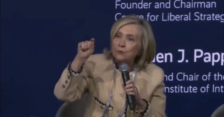 (video)-hillary-clinton-rails-against-“white-men”-and-maga-in-angry-rant-during-munich-panel,-claims-children-weren’t-detained-under-obama-and-bill-clinton