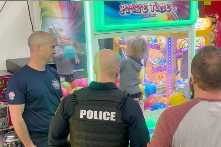 unfazed-missouri-toddler-is-rescued-from-claw-machine-after-getting-stuck-inside,-horrifying-parents