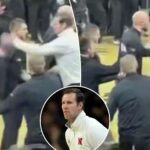 nebraska’s-fred-hoiberg-angrily-smacks-phone-out-of-iowa-fan’s-hand-in-tense-court-storming-scene