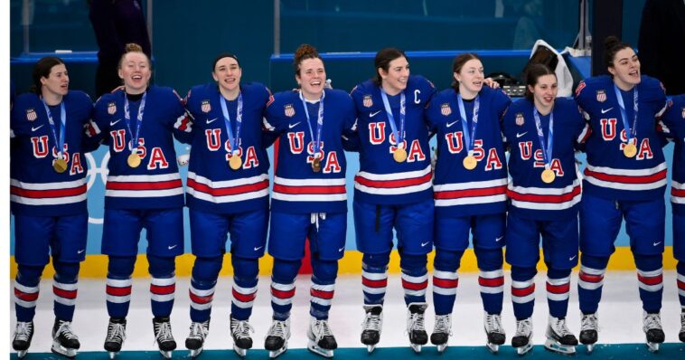 refreshing-change:-the-entire-usa-women’s-hockey-team-honored-america-by-standing-for-the-national-anthem-after-winning-gold-medal