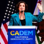 katie-porter-holds-‘f—-trump’-sign-at-california-democratic-convention