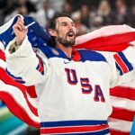 olympic-hero-connor-hellebuyck-shows-off-‘secretary-of-defense’-plaque-on-flight-to-white-house