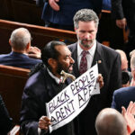 watch:-democrat-rep.-al-green-removed-for-protest-sign-during-trump’s-sotu