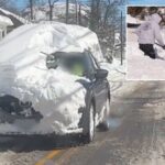 rhode-island-driver-blasted-for-cruising-around-with-mountain-of-snow-on-top-of-suv-after-historic-blizzard