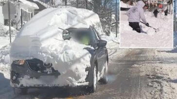 rhode-island-driver-blasted-for-cruising-around-with-mountain-of-snow-on-top-of-suv-after-historic-blizzard