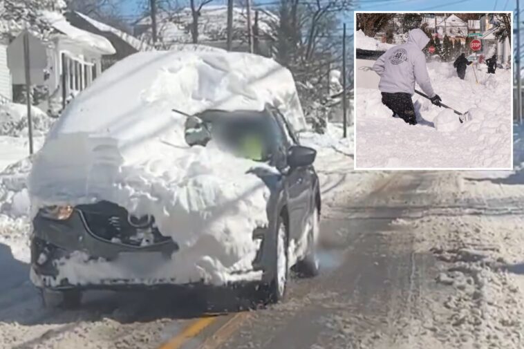rhode-island-driver-blasted-for-cruising-around-with-mountain-of-snow-on-top-of-suv-after-historic-blizzard