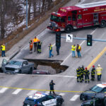 sinkhole-suddenly-opens-at-red-light,-swallowing-nebraska-drivers