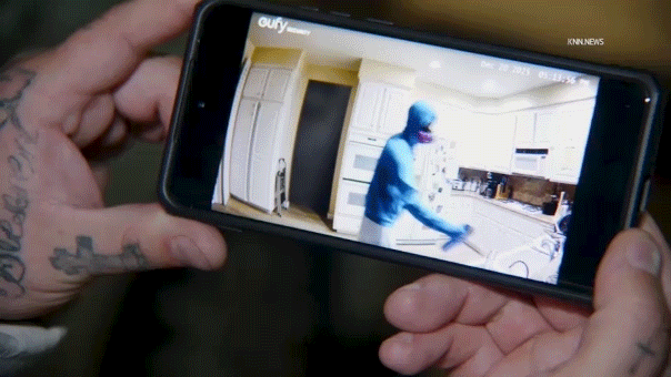 video-appears-to-show-gas-mask-wearing-roommate-allegedly-spraying-poison-on-couple’s-food