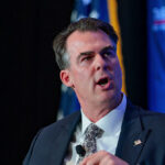 gop-governor-kevin-stitt-says-states-should-import-migrants-for-boeing,-construction-jobs