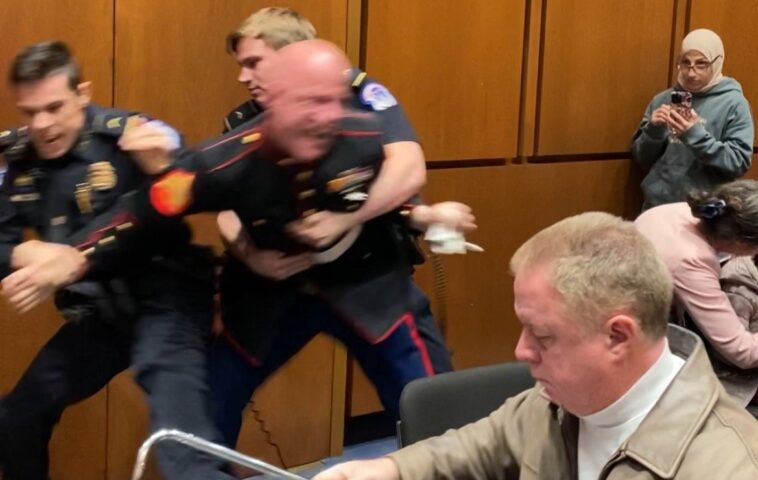 breaking-exclusive:-capitol-police,-senator-sheehy-charge-and-tackle-belligerent-anti-war-marine-veteran-at-senate-armed-services-committee-meeting-(video)