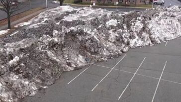 nj-rail-line-takes-bets-on-when-‘snow-mountain’-in-station-parking-lot-will-finally-melt