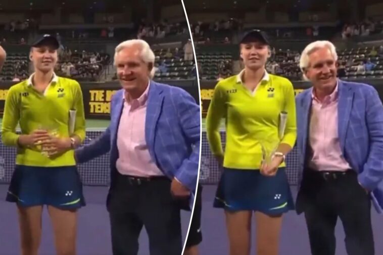 tennis-star-elena-rybakina-removes-presenter’s-hand-from-her-back-in-awkward-trophy-ceremony