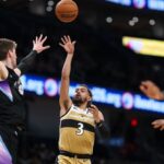 despite-rust,-young-dazzles-wiz-crowd-in-debut