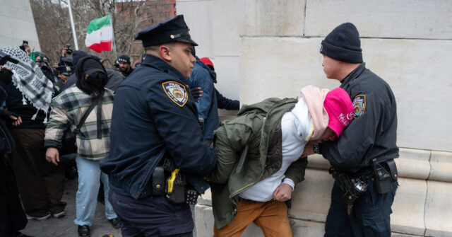 watch:-man-is-pummeled-by-khamenei-mourners-in-nyc-after-snatching-poster-of-‘supreme-leader’