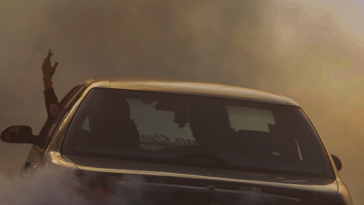 watch:-woman-allegedly-plows-into-cop-in-street-takeover,-goes-free-on-low-bail