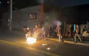 anti-ice-thug-receives-instant-karma-while-trying-set-us-flag-on-fire-during-protest-in-portland-(video)