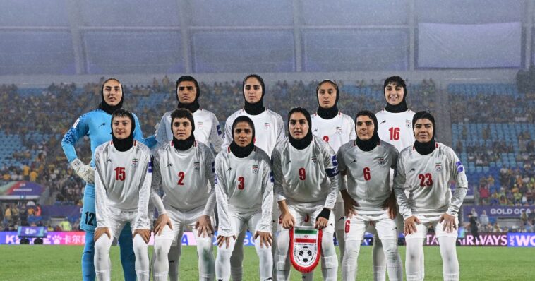 iranian-women’s-soccer-team-appears-to-cry-for-help-with-subtle-hand-gesture