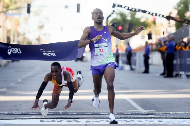 la-marathon-ends-in-stunning-photo-finish-between-american-coach-and-kenyan-runner