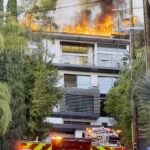 inferno-erupts-at-hollywood-hills-mansion-as-flames-rip-through-roof