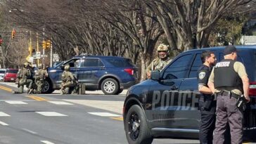 report:-baltimore-police-officer,-barricaded-suspect-shot-in-gunfire-exchange