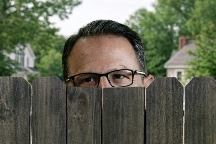 the-backyard-battle-between-dem-governor-and-couple-next-door