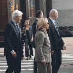 hillary-clinton-caught-on-video-stepping-back-after-pushy-former-president-nudges-her-at-busy-nyc-intersection