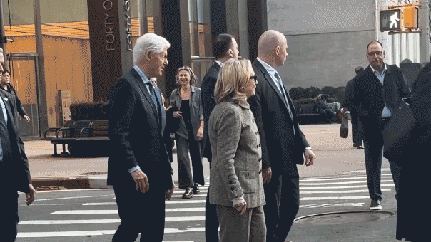 hillary-clinton-caught-on-video-stepping-back-after-pushy-former-president-nudges-her-at-busy-nyc-intersection