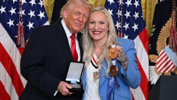 us-olympic-bobsledder-surprises-trump,-awards-him-prestigious-order-of-ikkos-medal