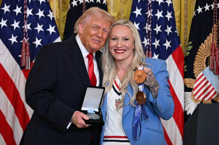 us-olympic-bobsledder-surprises-trump,-awards-him-prestigious-order-of-ikkos-medal