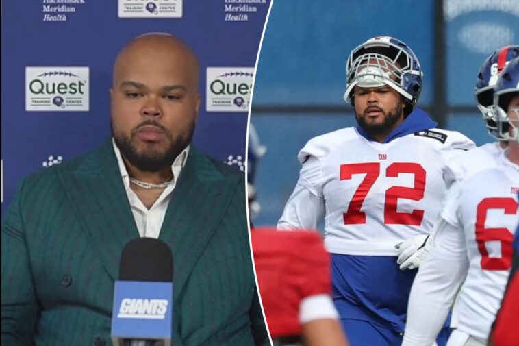 giants’-jermaine-eluemunor-dressed-for-success-at-career-contract-signing