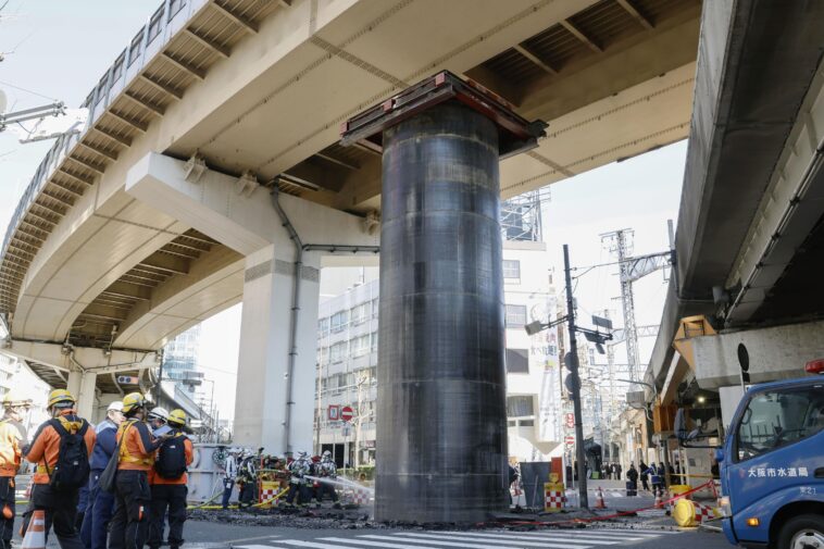 giant-pipe-mysteriously-bursts-through-ground,-rises-30-feet-above-road-in-japan